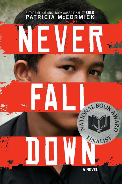 Book cover: close-up of a boy's face crossed by red bands with the title, and a National Book Award finalist seal.