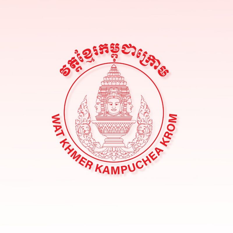 A round red seal with a tiered crown on a pedestal, Khmer script above and the name in English below.