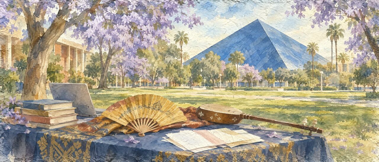 Watercolor of a club table on a campus lawn with dance fans, books and a laptop