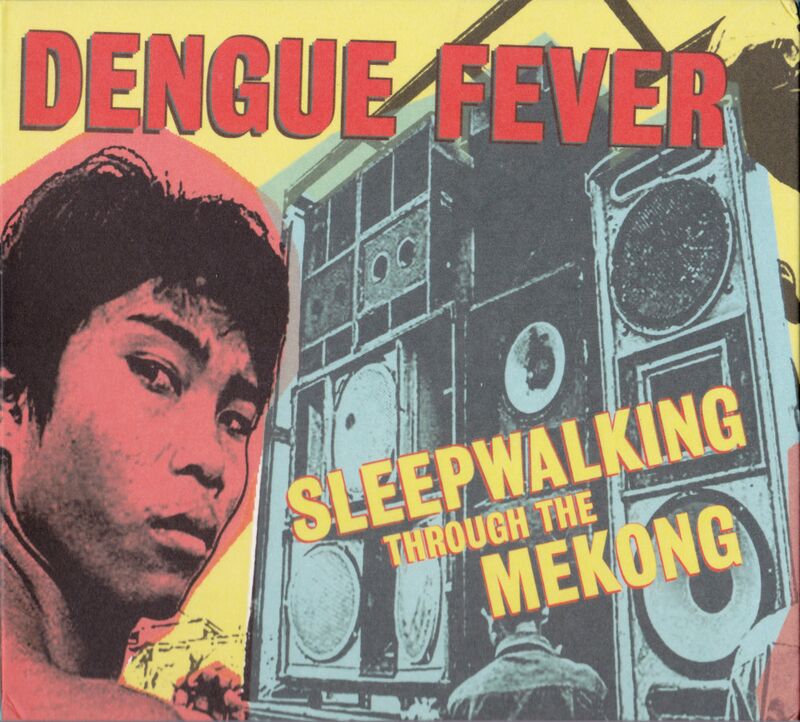 Album cover in red, yellow and blue tones: a young man's face beside a tall stack of loudspeakers, with the title in yellow.