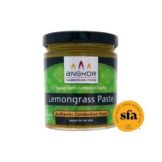 A glass jar with a green label reading Lemongrass Paste, Authentic Cambodian Food, with a gold award seal.