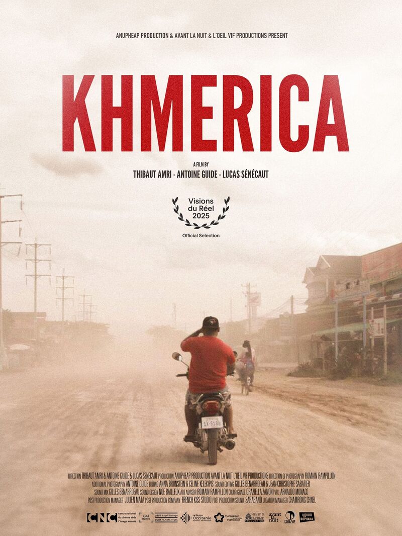 Film poster: a man on a motorbike rides down a dusty street in pale light under the red title.